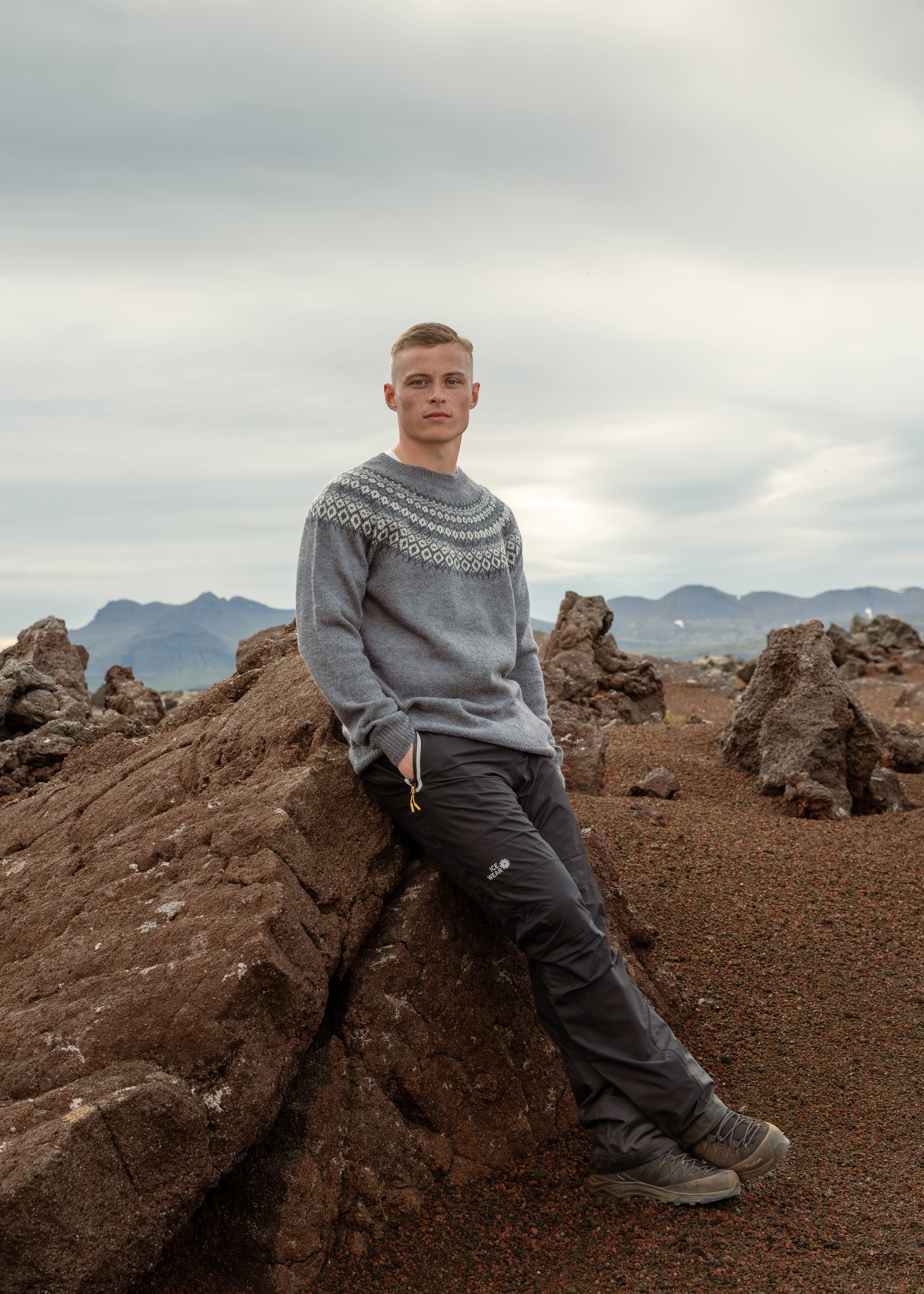 Man sitting on cliff