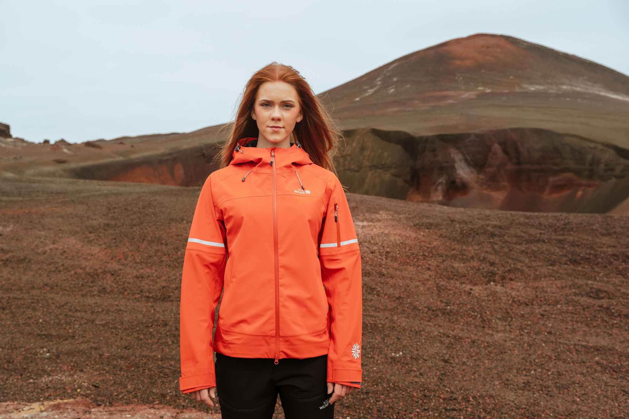 iceland-woman-orange-rainjacket-hardshell_71.jpeg