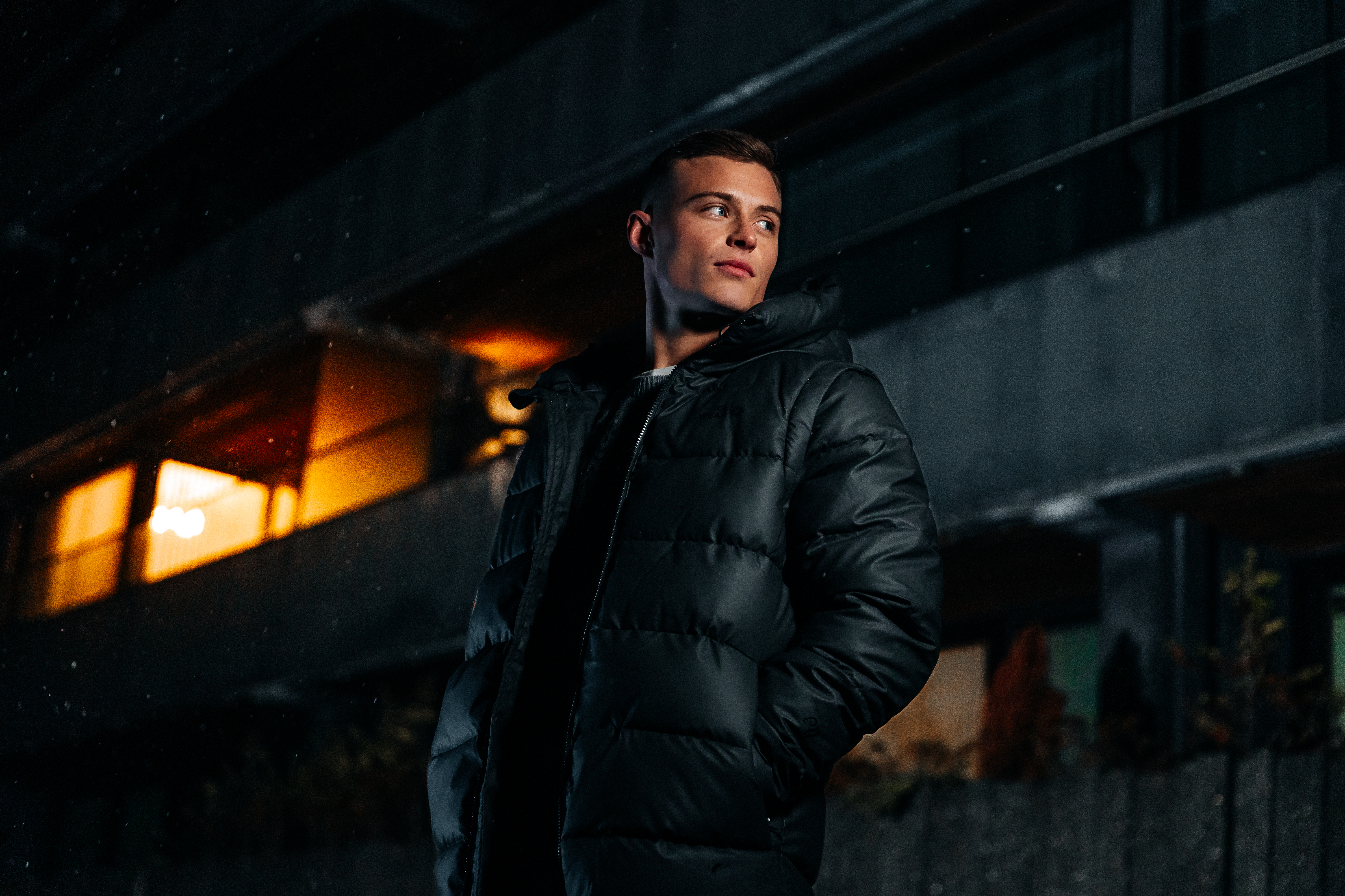 man in the dark in a black jacket