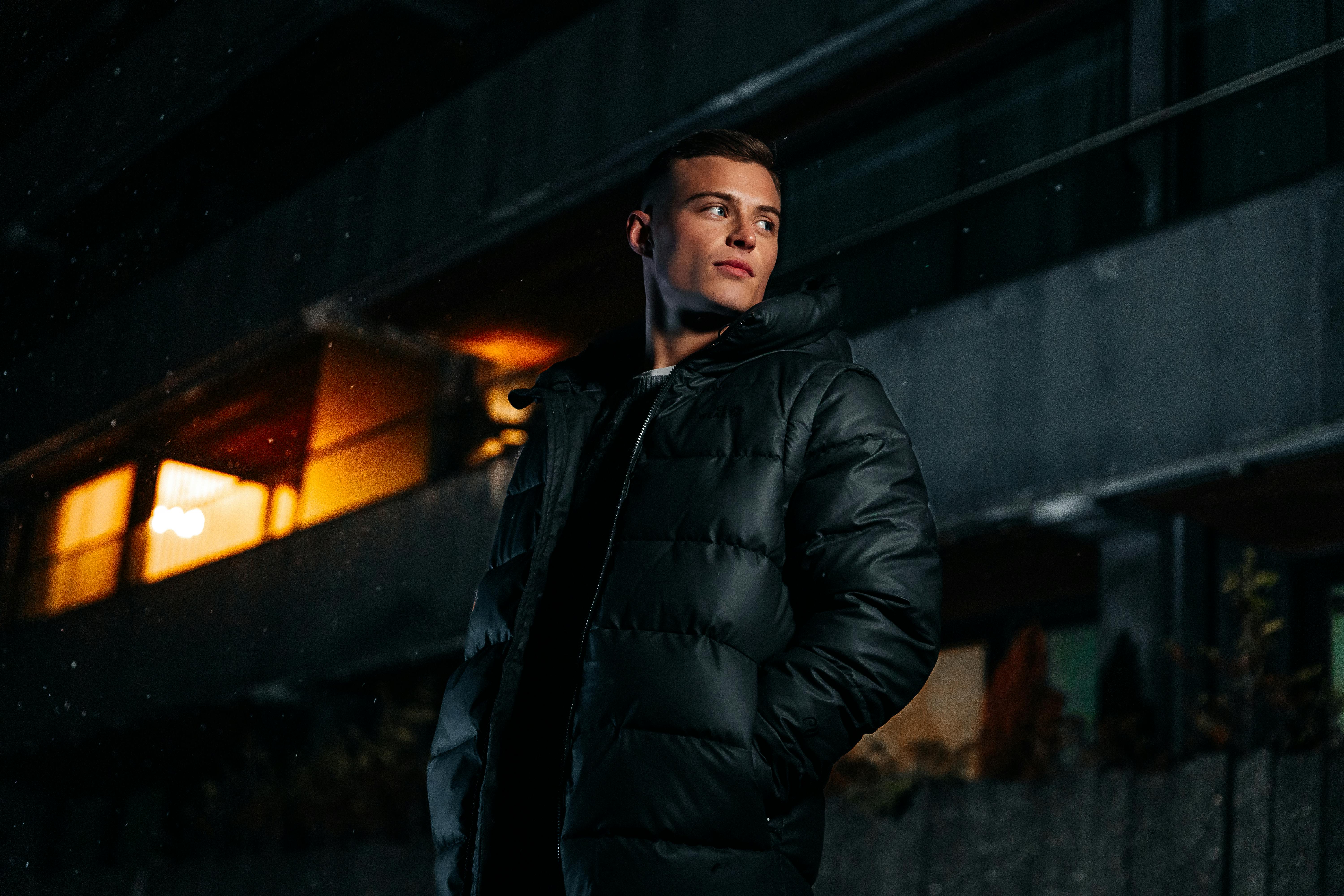 man in the dark in a black jacket