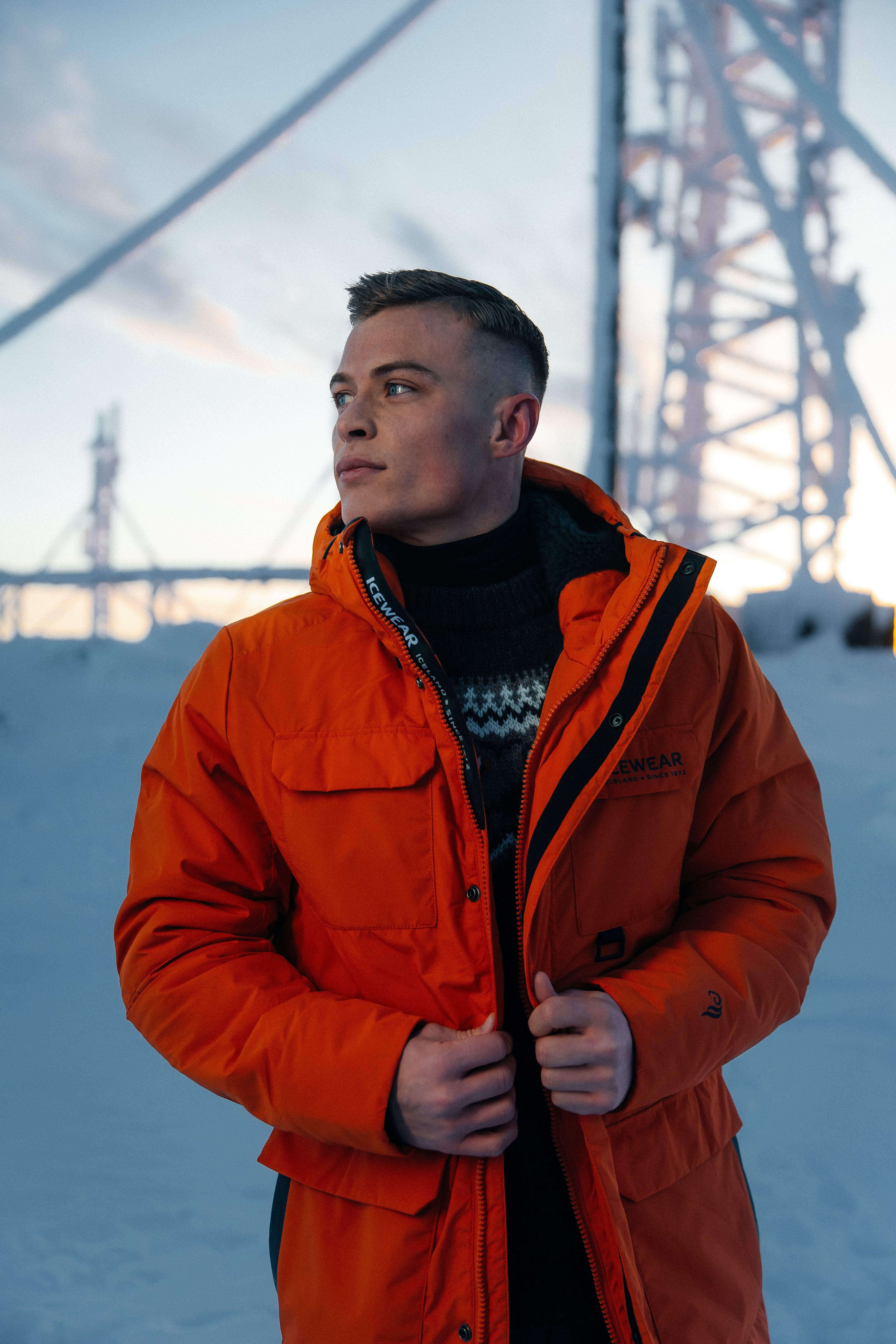 man in warm parka, a cold winter and snow day in Iceland