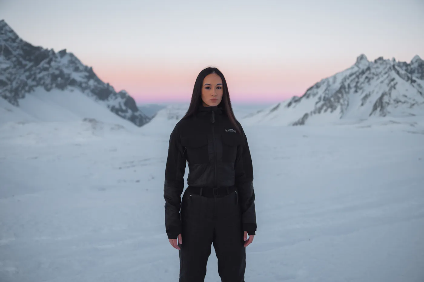 A woman up on a mountain, a lot of snow