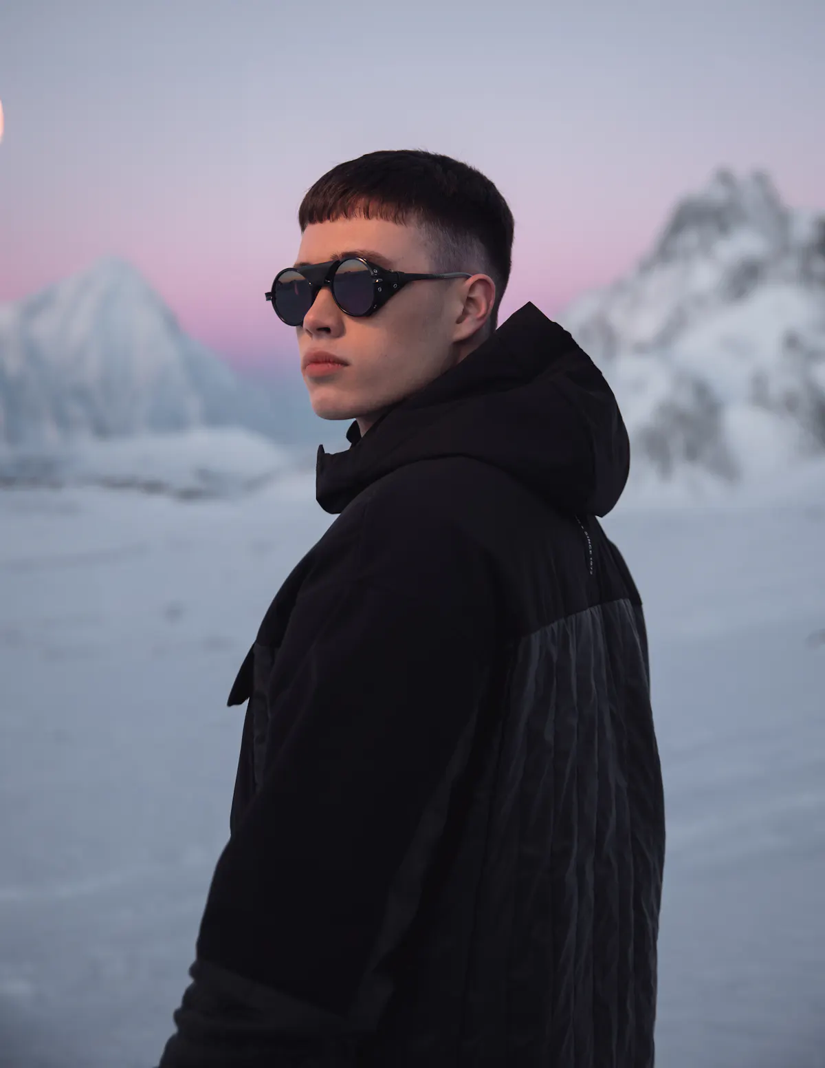 man with sunglasses in mountain, lot of snow