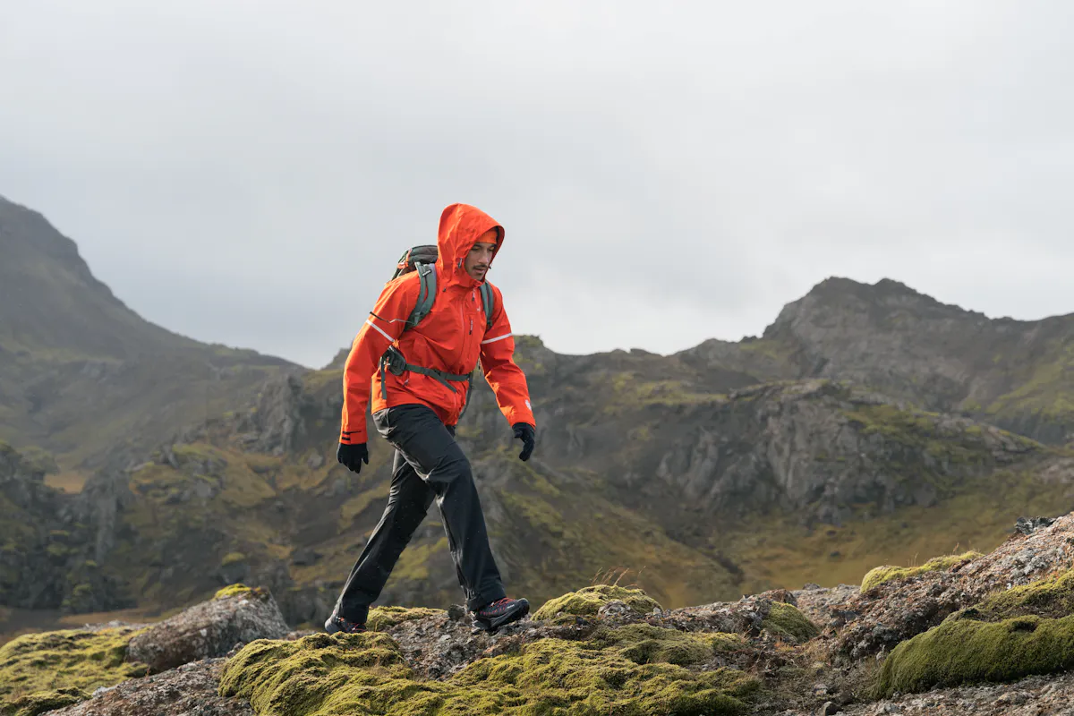 man hiking, wearing Icewear shell jacket