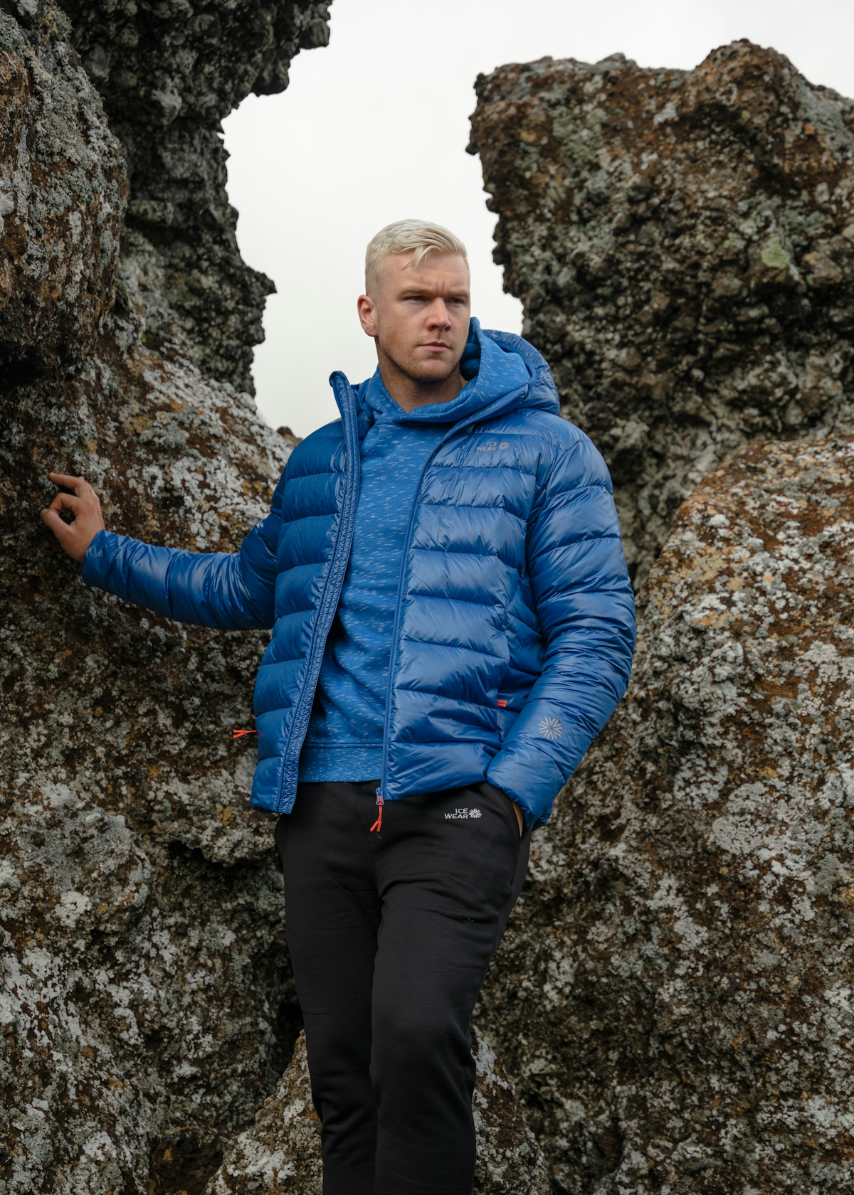 man-standing-blue-puffer-jacket-32.jpeg