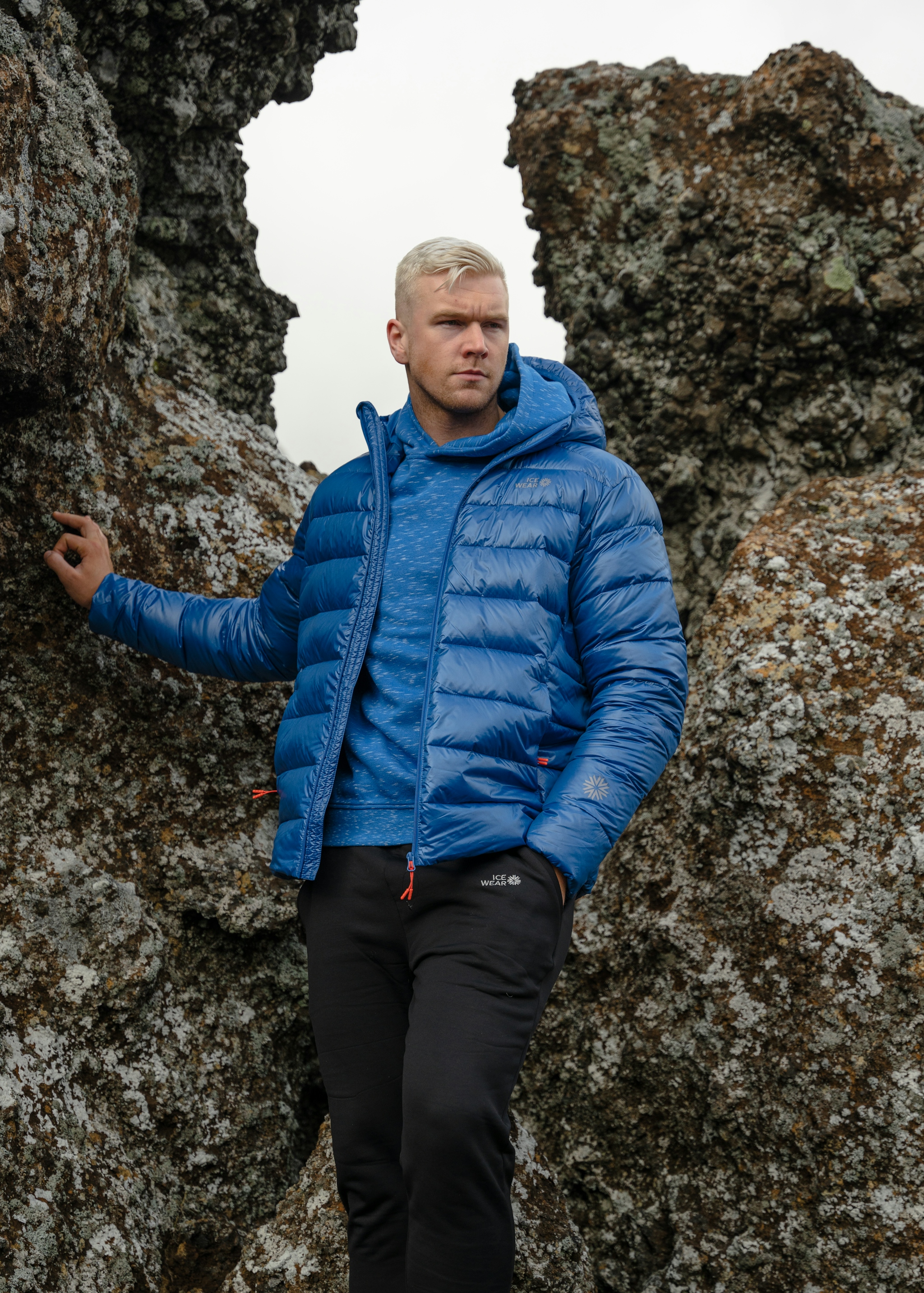 man-standing-blue-puffer-jacket-32.jpeg