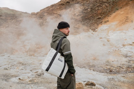 man with a bag at the Icelandic hot springs