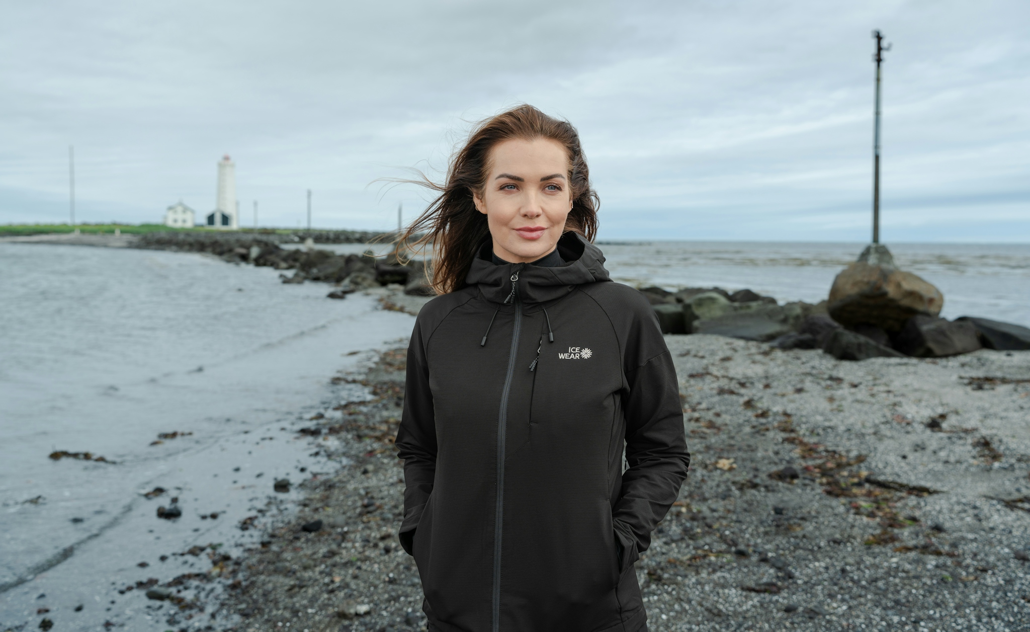 woman-black-jacket-beach.jpeg