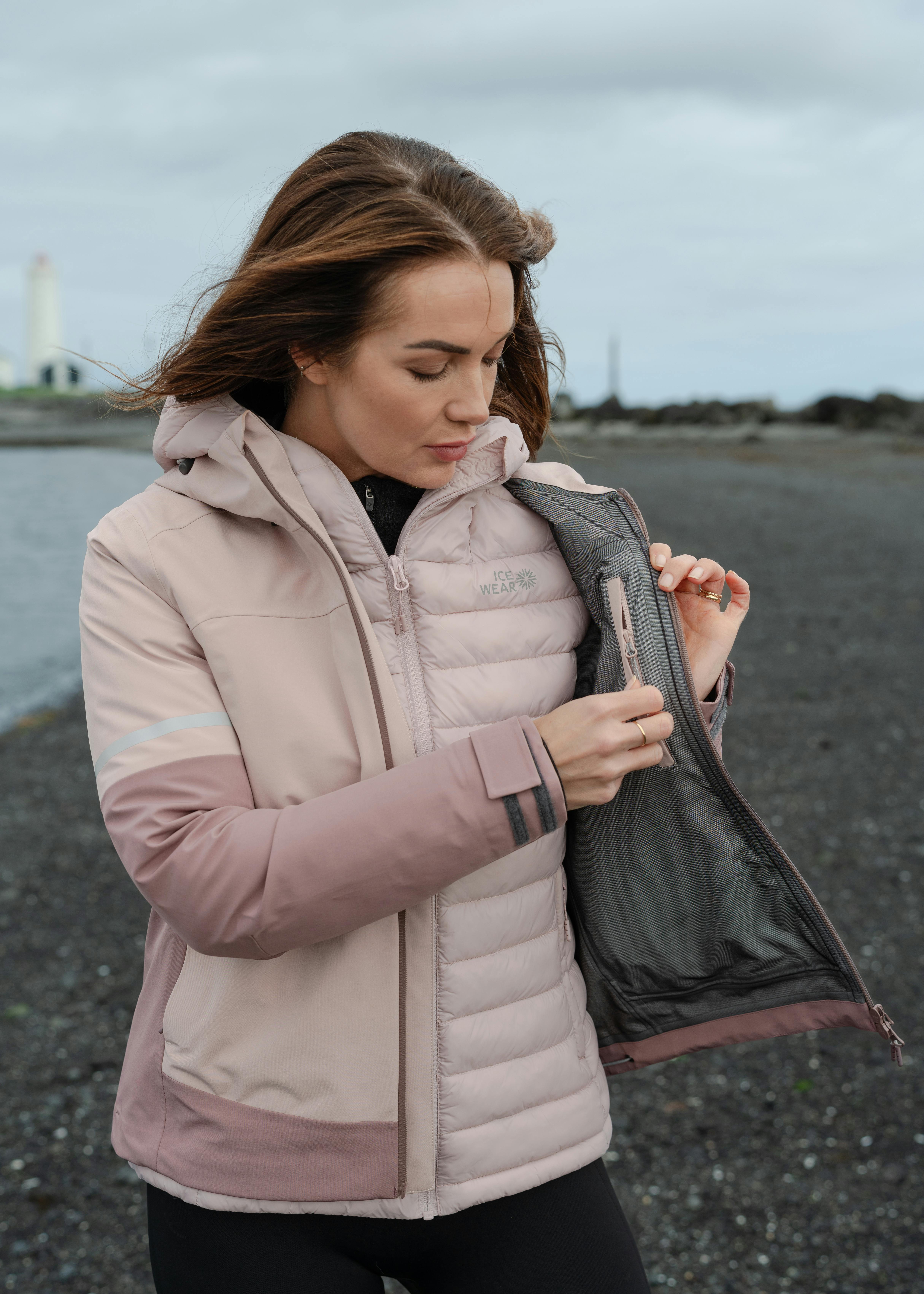 woman in pink jacket