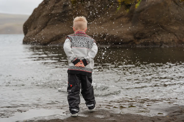 kid playing in the water