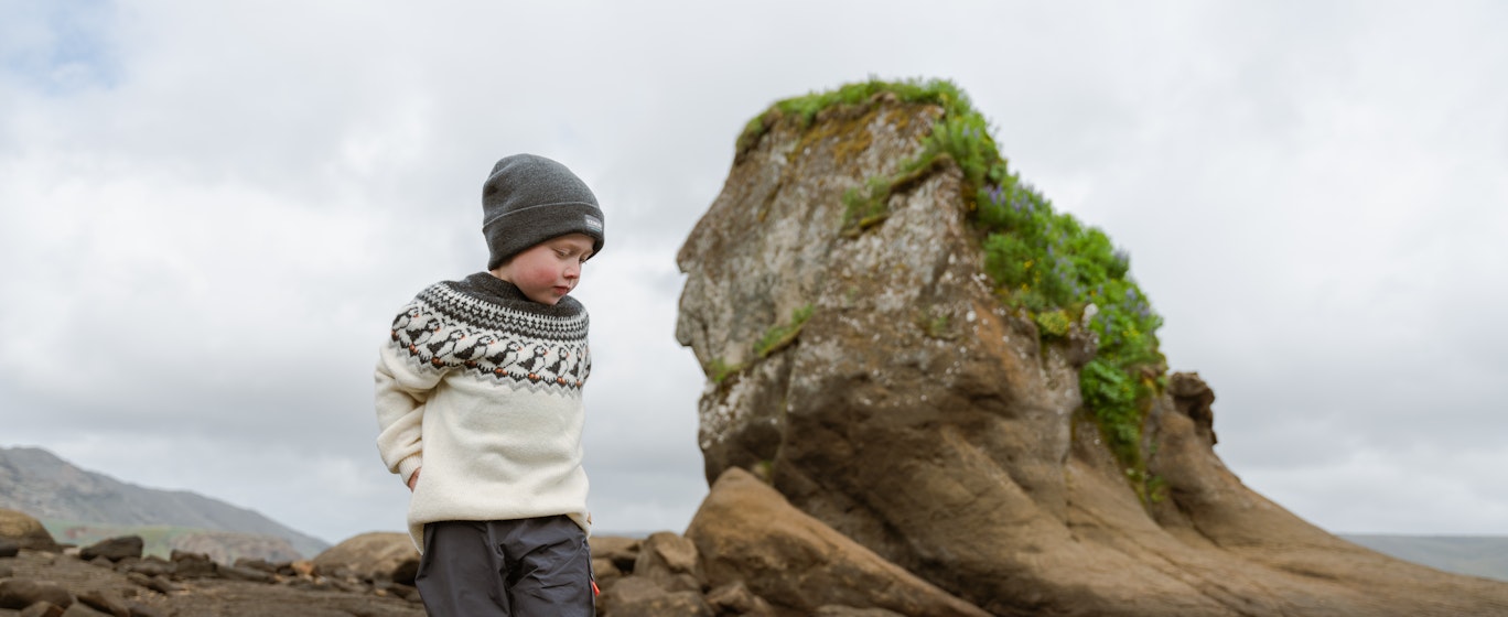 boy walking in water