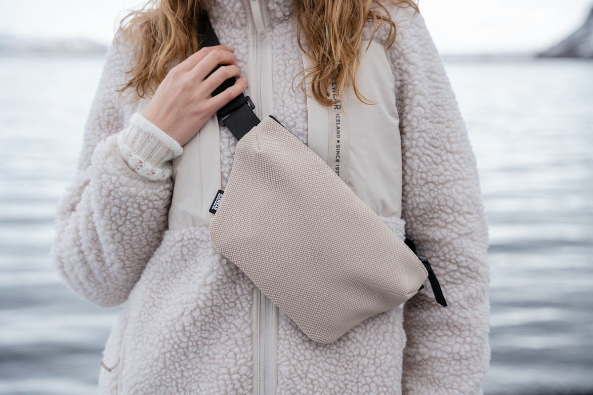 iceland-woman-bumbag-white-sherpa-coat-13.jpeg