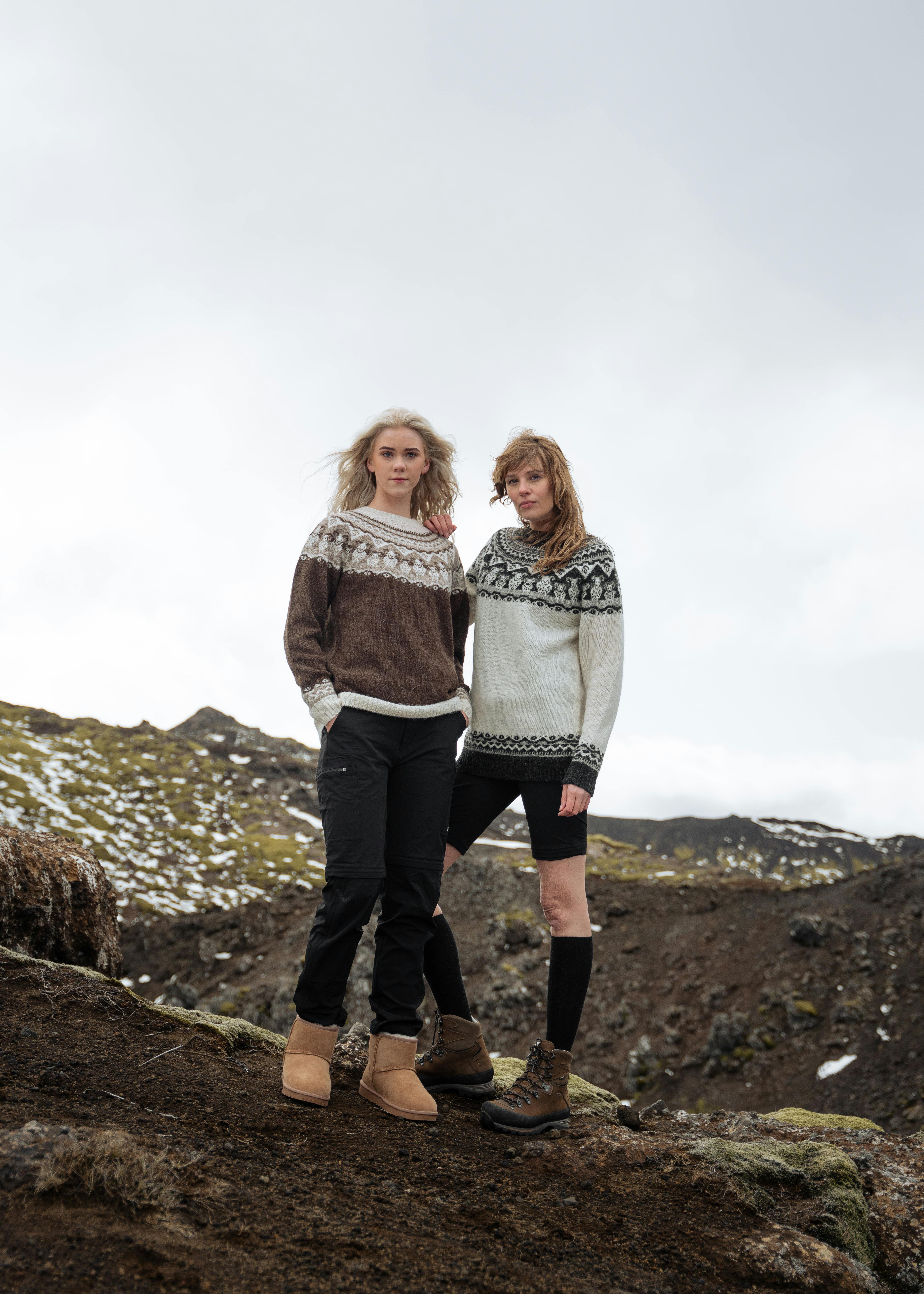 Women in woollen sweaters up the mountain