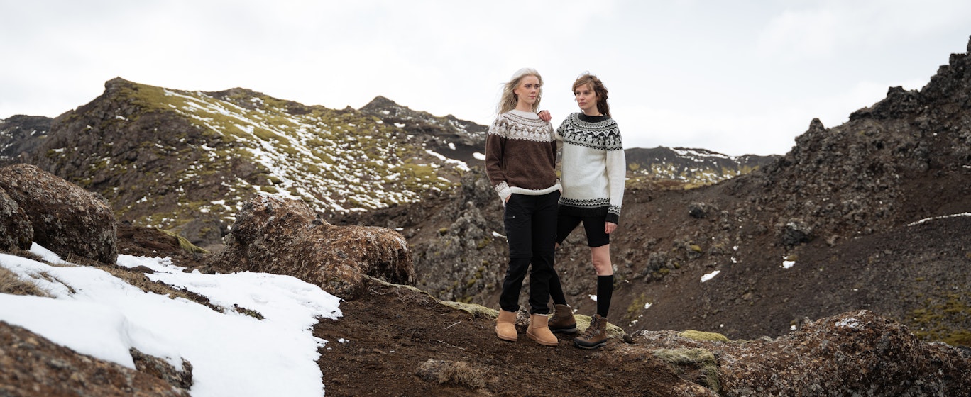 Women in woollen sweaters up the mountain