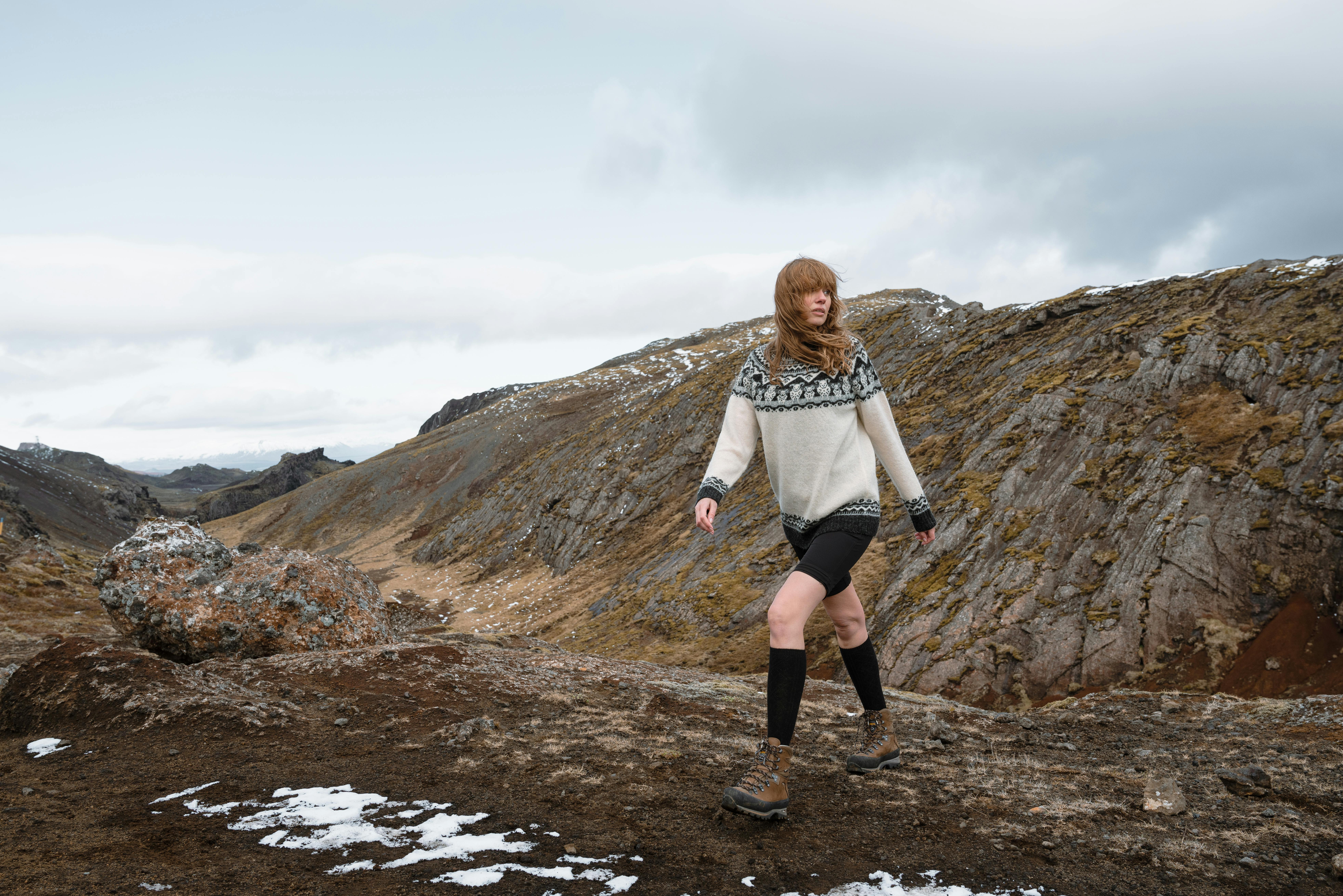 Woman walking on a mountain