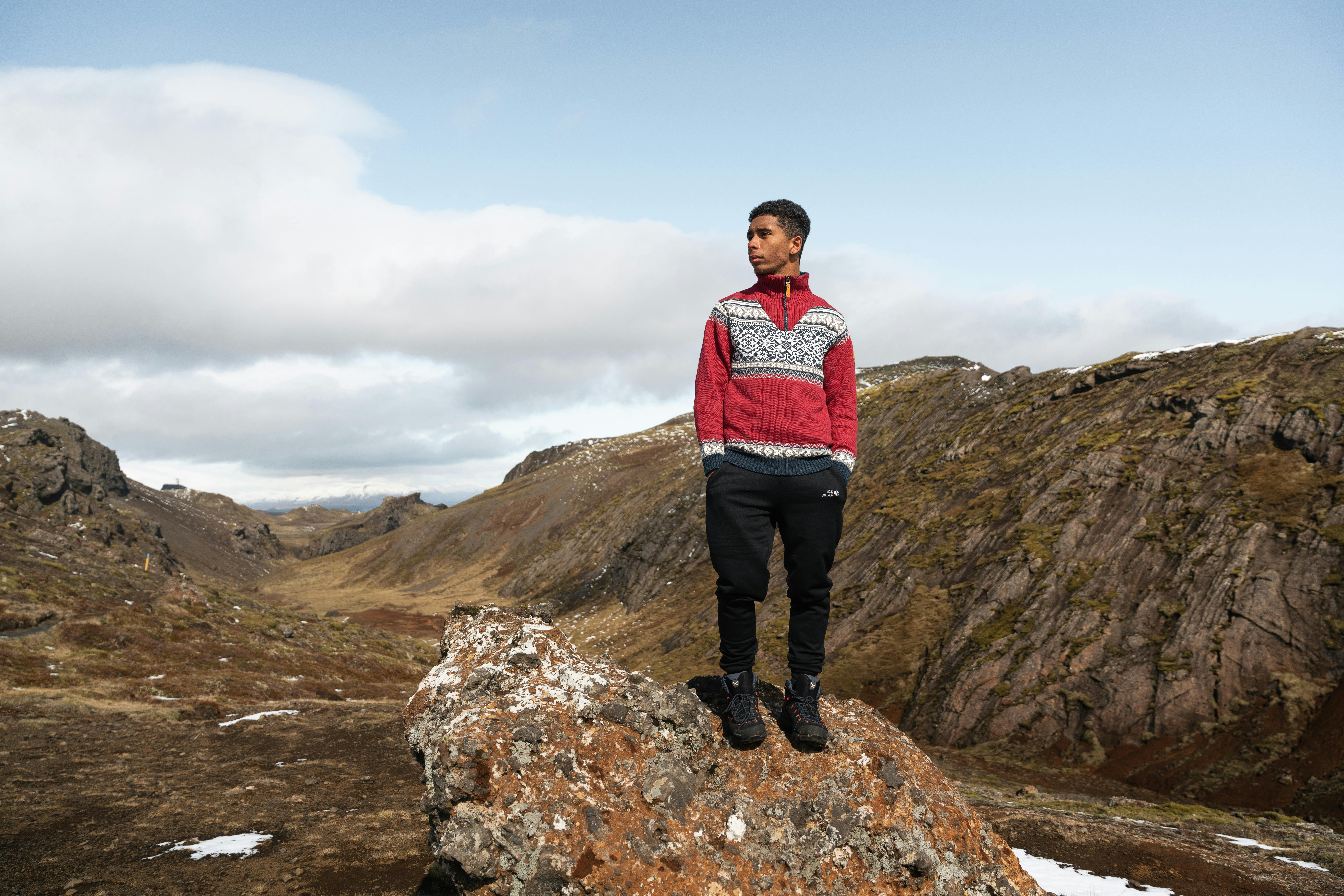 Man on a rock on a mountain