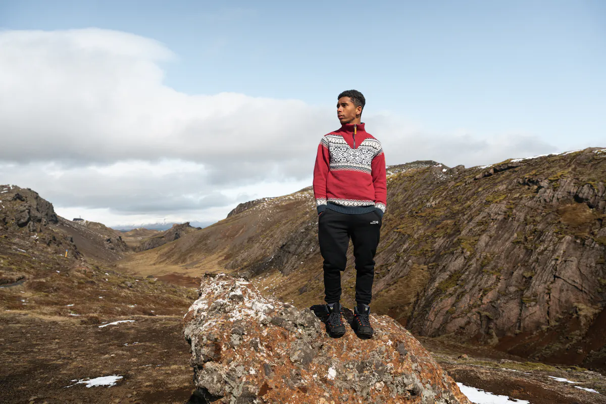 Man on a rock on a mountain