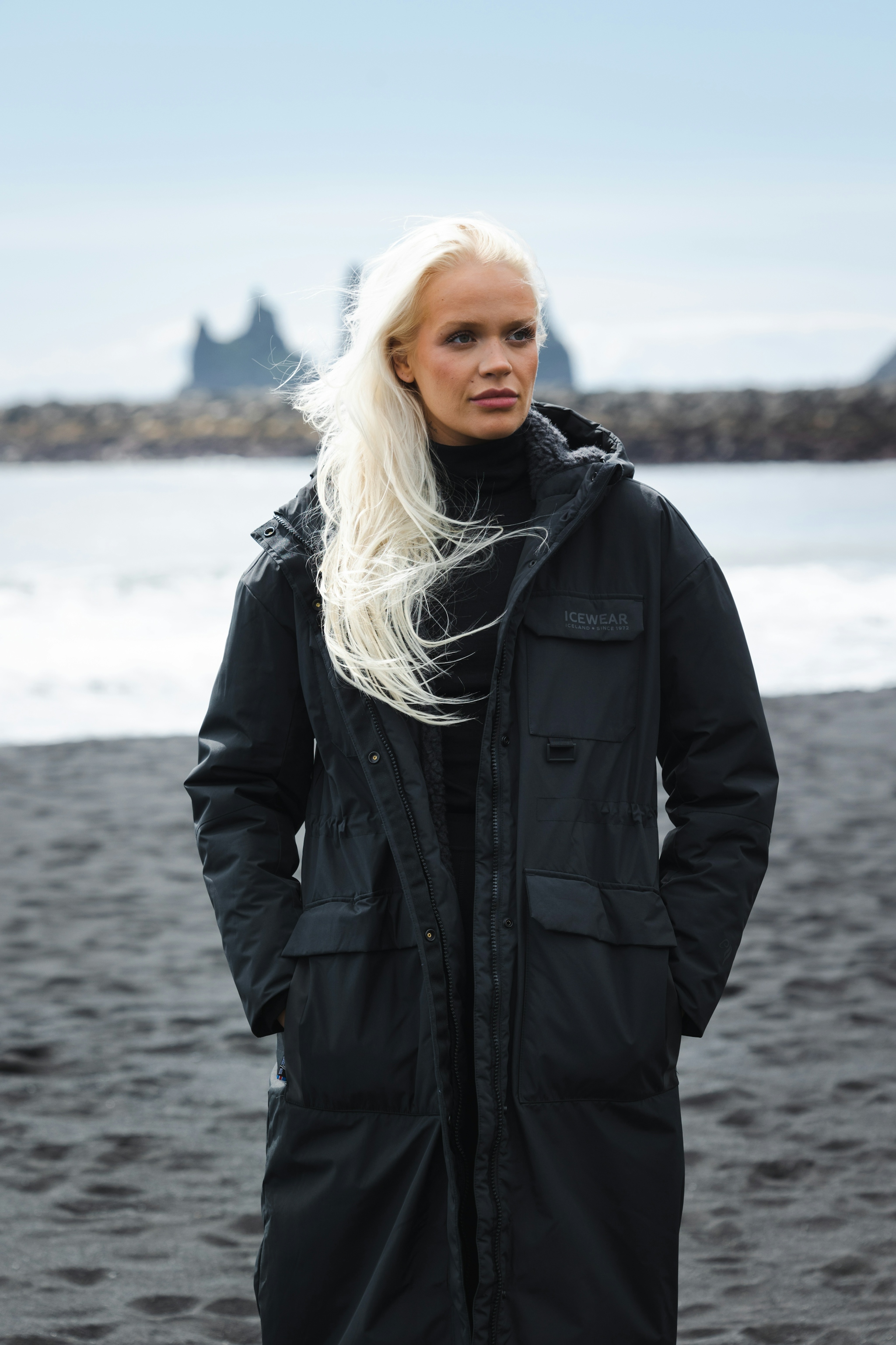 woman-long-black-jacket-beach-7.jpeg