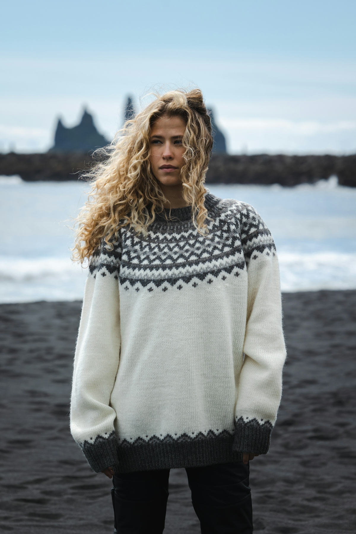 woman-white-wool-sweater-blackbeach.jpeg