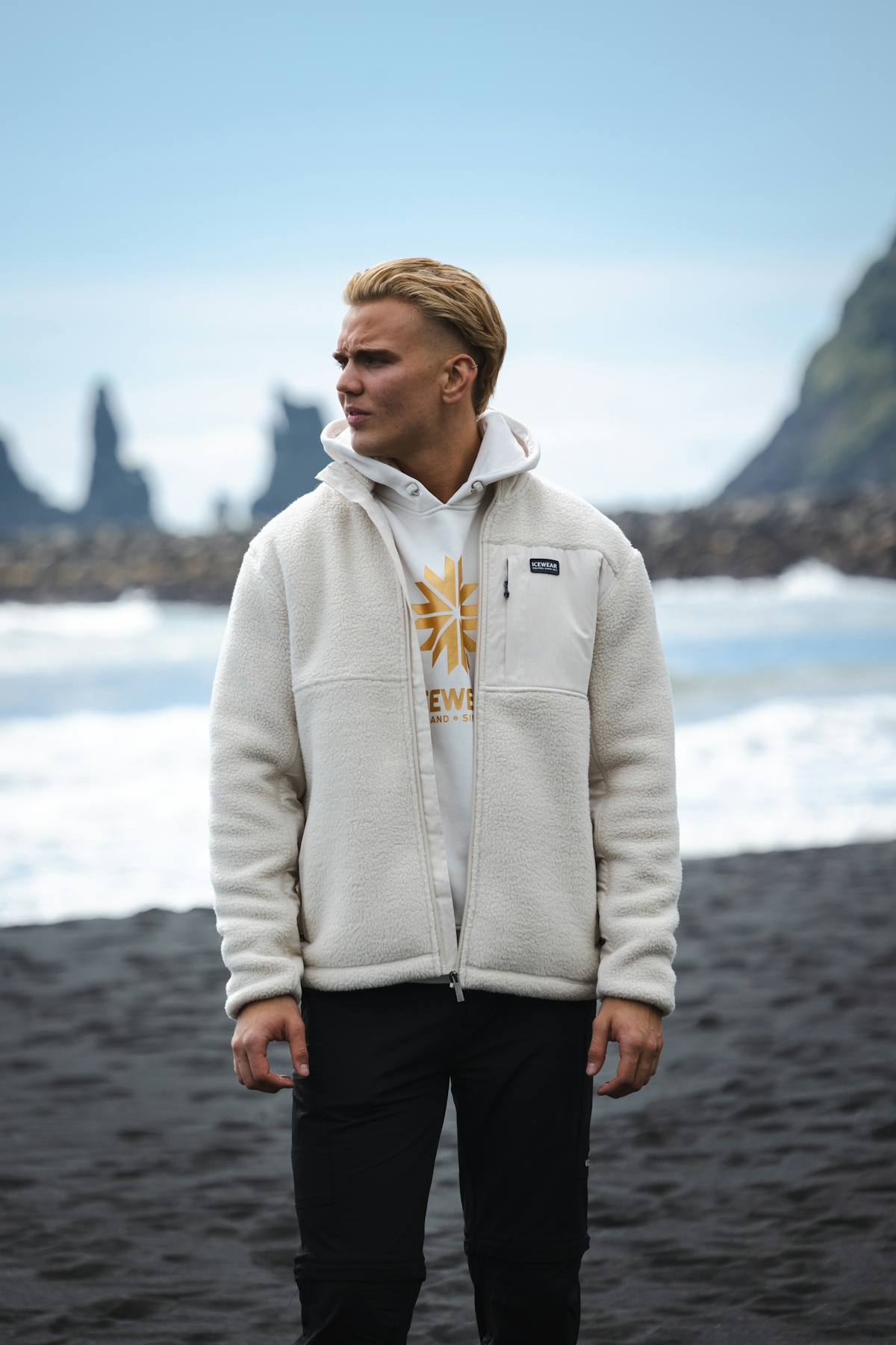 man-white-hoodie-sweater-blackbeach.jpeg