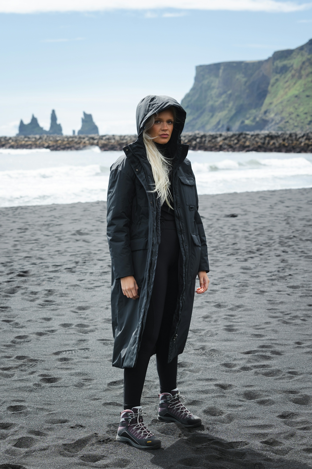 woman-long-black-jacket-beach-3.jpeg