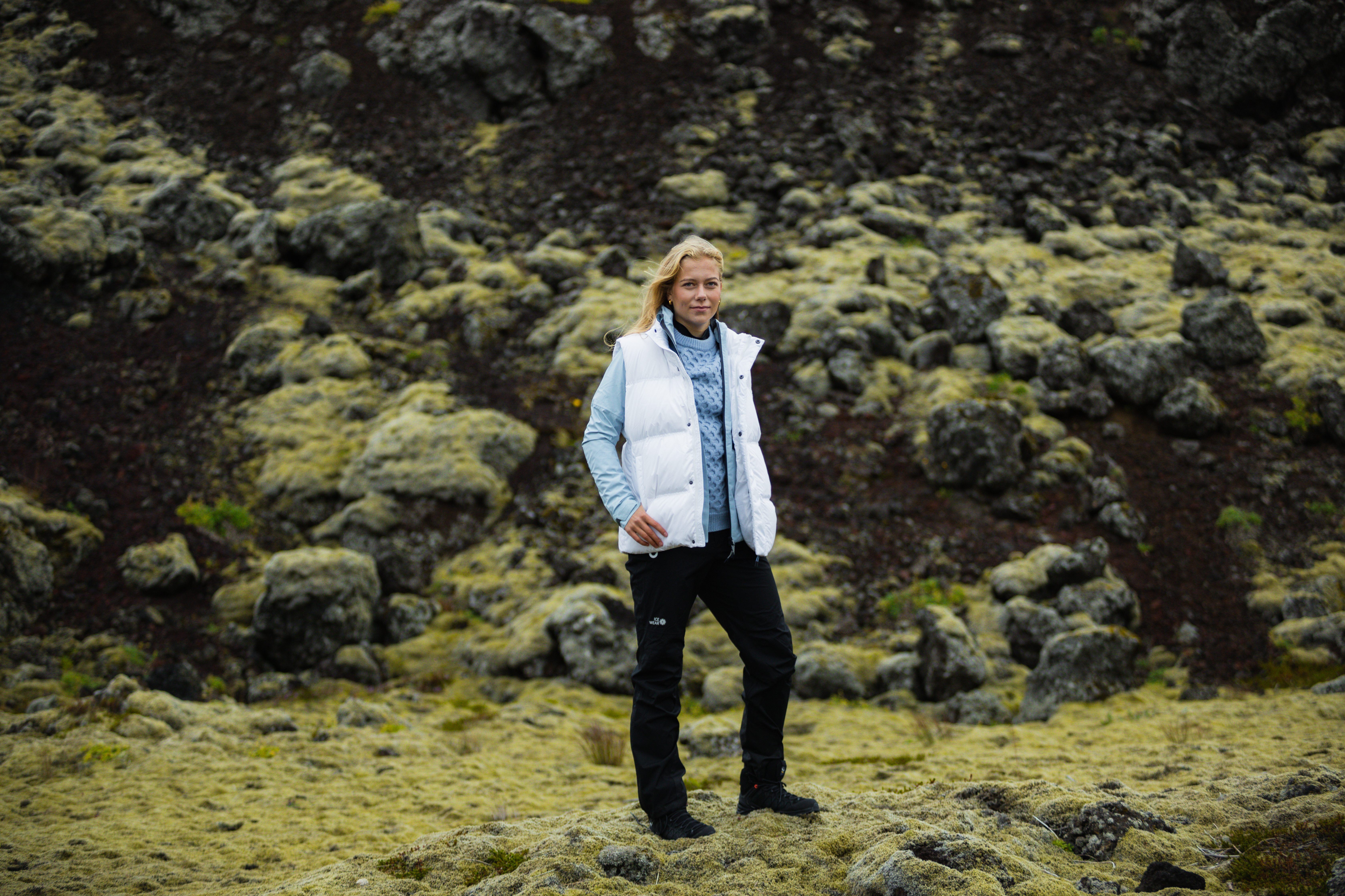 woman standing in Icelandic moss