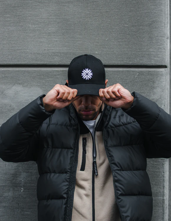 man with a black cap