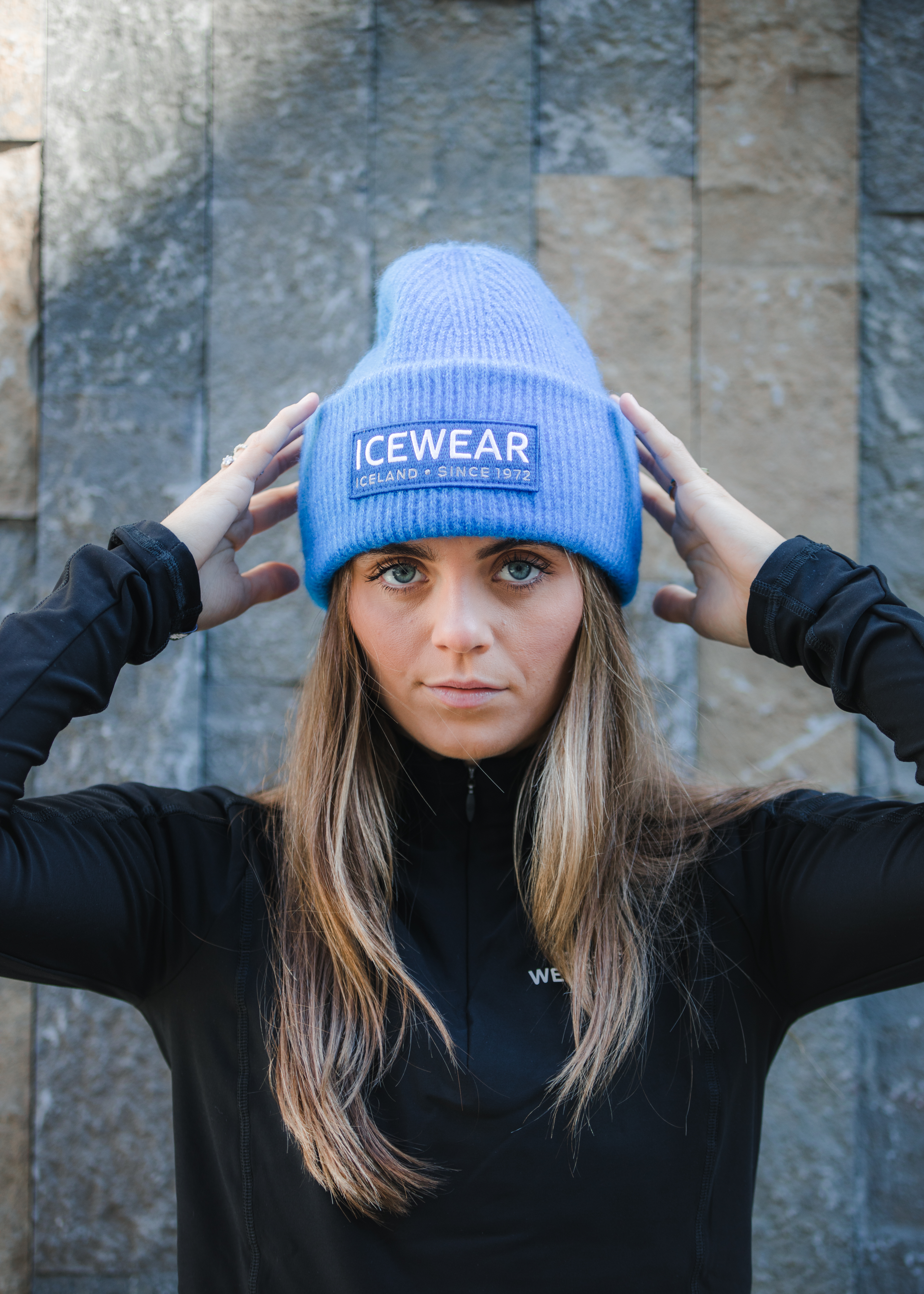 woman wearing warm hat, must have in Icelandic winter and sometimes summer