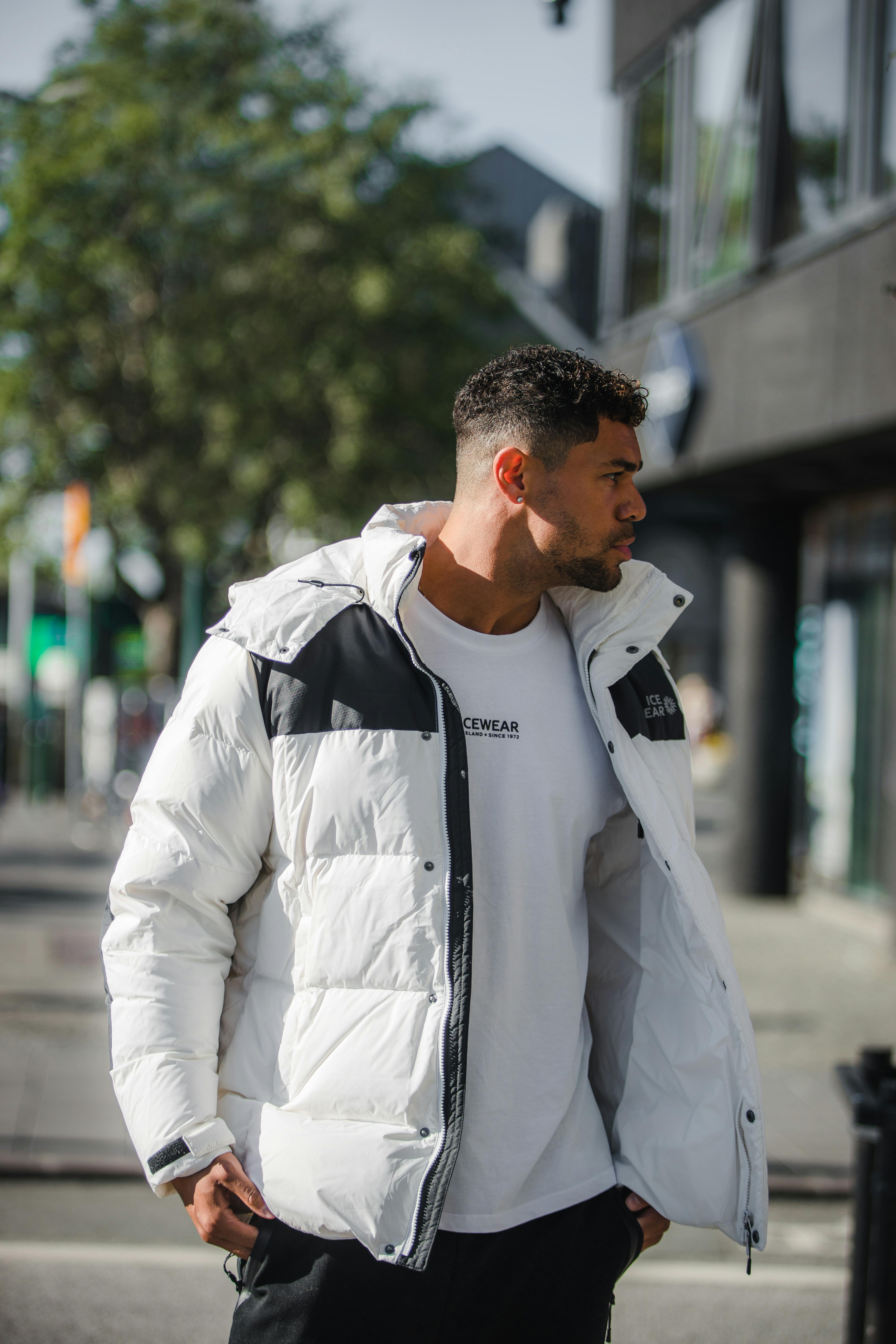 man wearing down jacket in Reykjavík city center