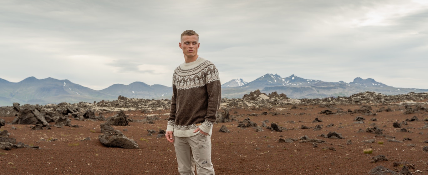 man and mountain behind him