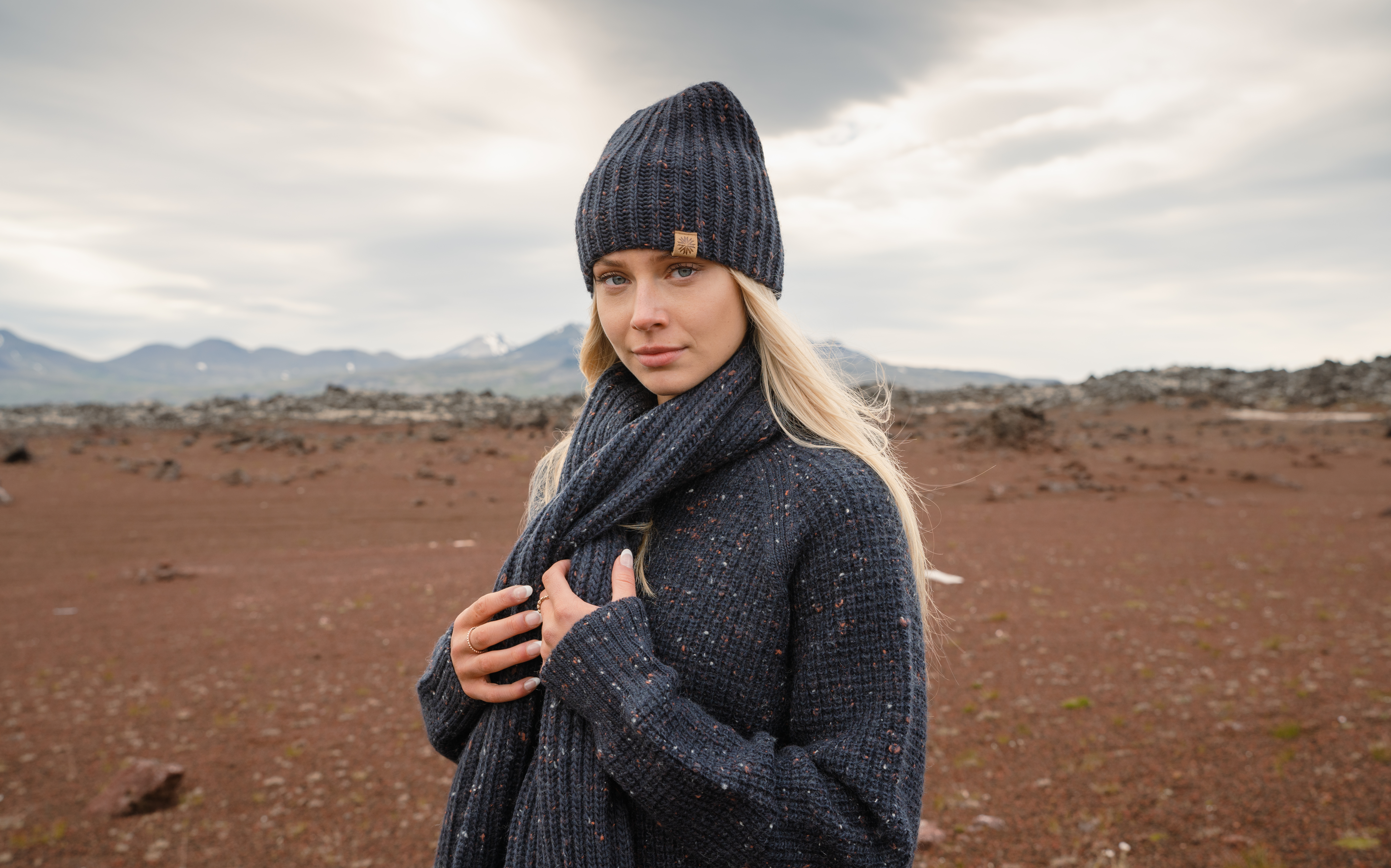 woman in wool sweater, hat and scarf