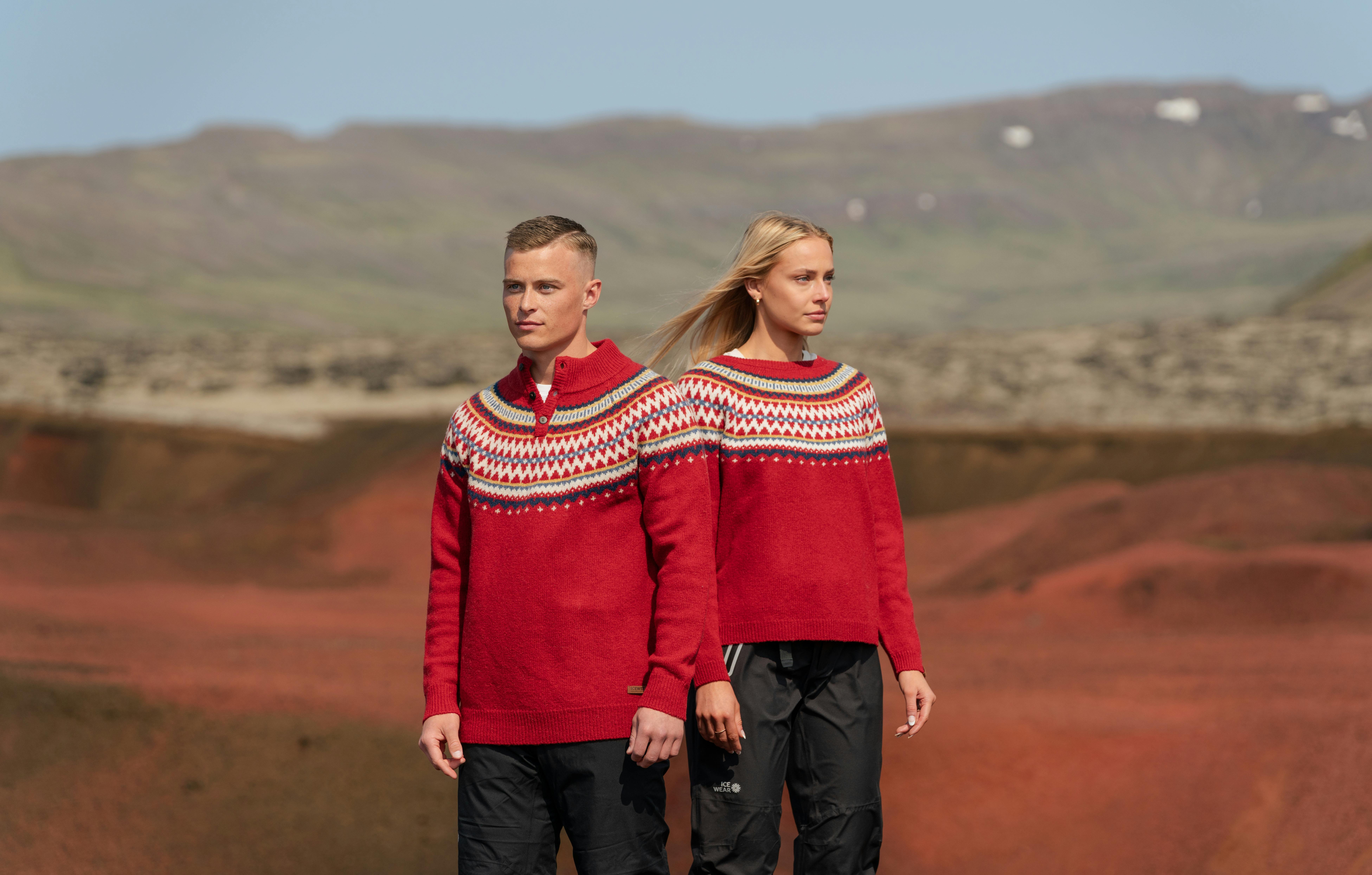 A couple in Christmassy sweaters