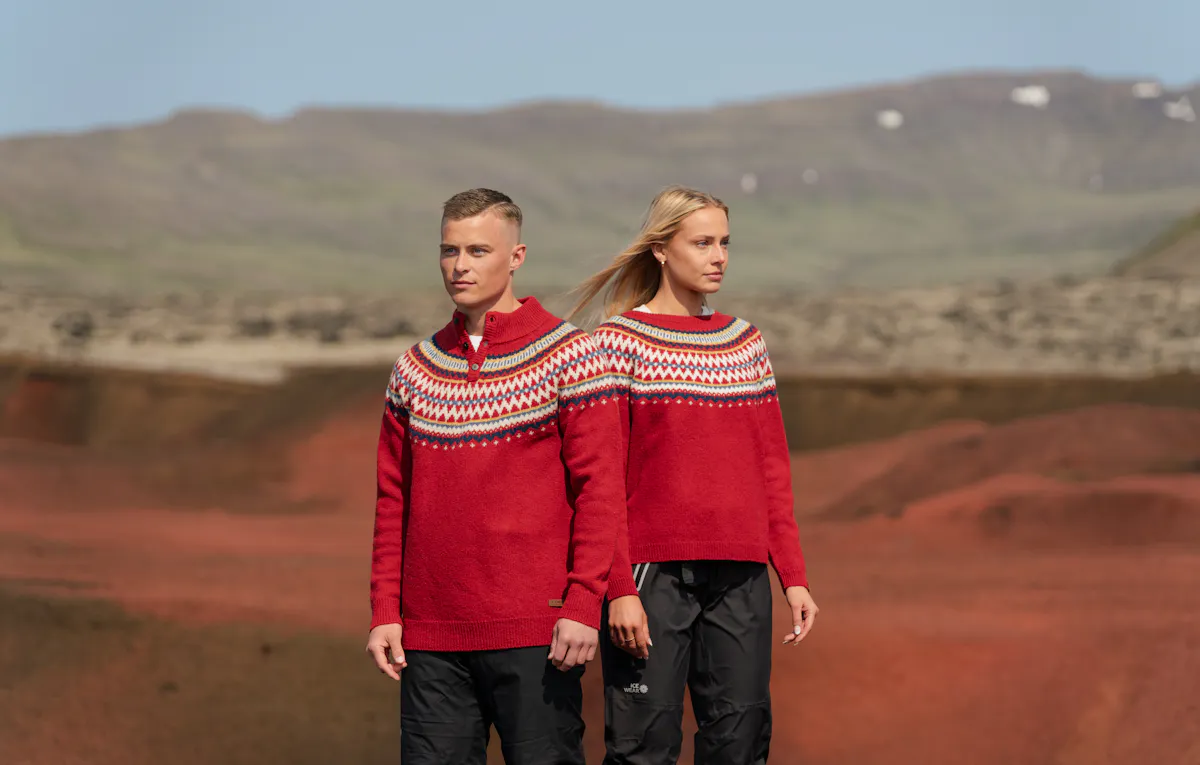 A couple in Christmassy sweaters