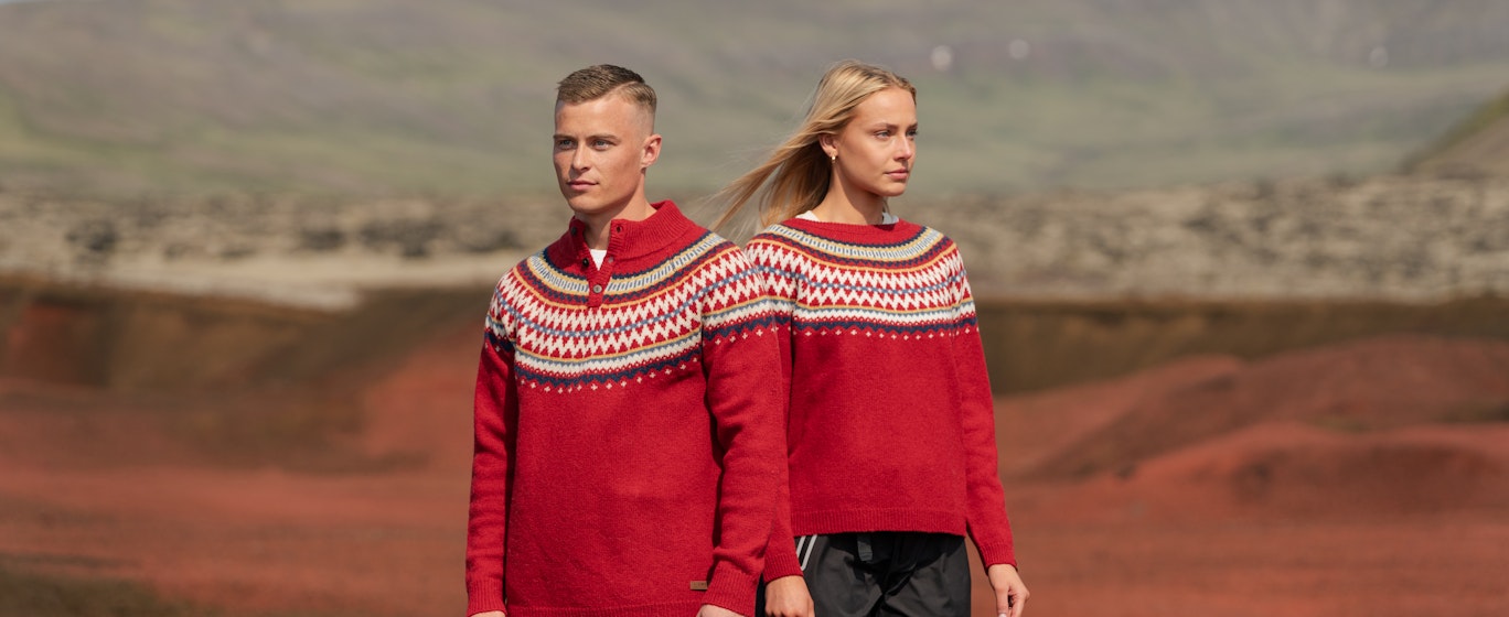 A couple in Christmassy sweaters