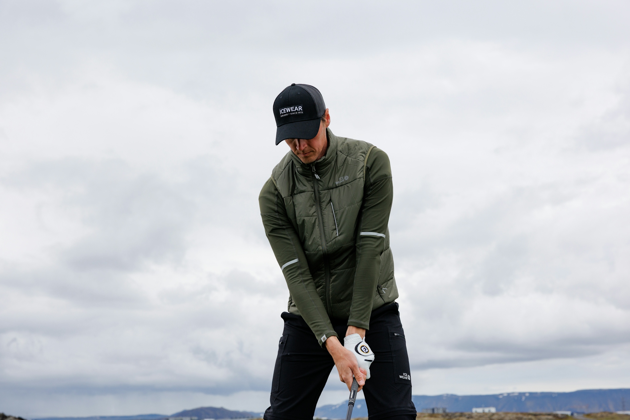 0057-man-playing-golf-iceland.jpeg